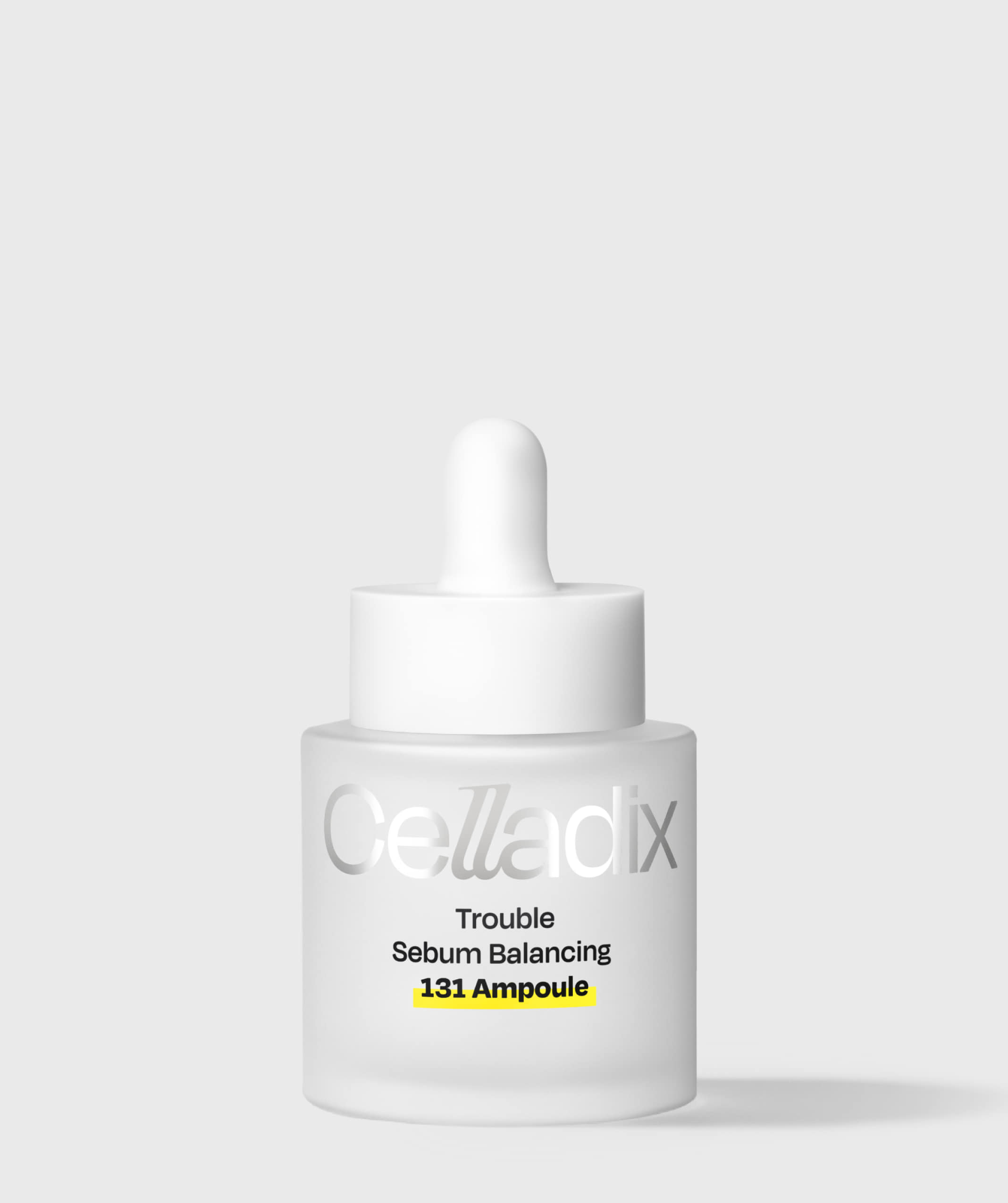 淺灰背景上直立的霧面白色 Celladix 滴管瓶，標籤為「Trouble Sebum Balancing 131 Ampoule」，「131 Ampoule」以黃色螢光標示。