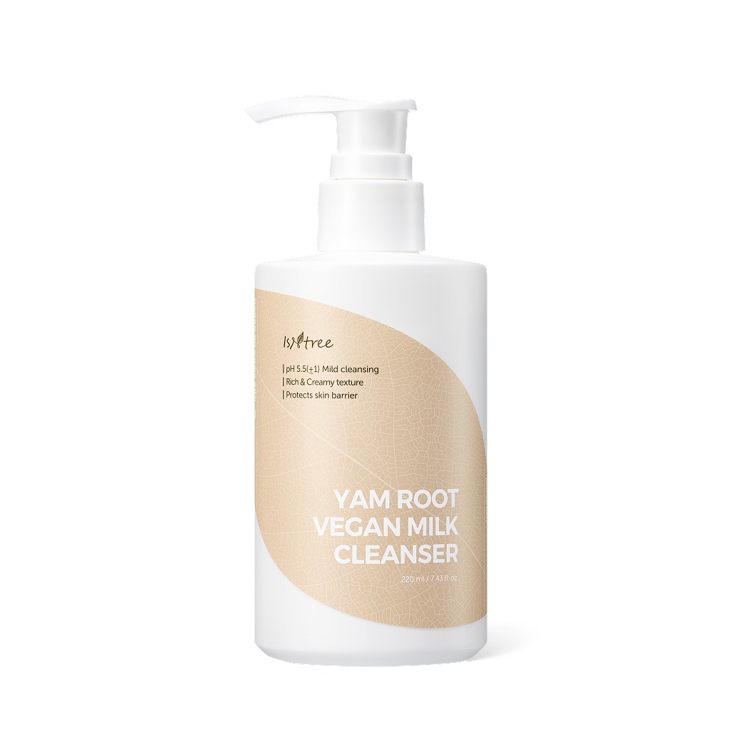 Frasco blanco con dosificador, de pie sobre fondo blanco, con etiqueta beige en forma de hoja que dice «Isntree» y «YAM ROOT VEGAN MILK CLEANSER 220 ml / 7.43 fl. oz».