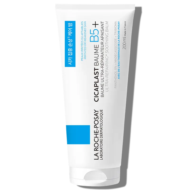 White squeeze tube standing on its white flip cap, printed sideways with 'LA ROCHE-POSAY', 'CICAPLAST BAUME B5+' and '200 ml' in black and blue, with a blue Korean sticker strip and blue square accents.