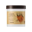 A wide jar with a dark brown lid and a kraft-paper label showing carrots, on white